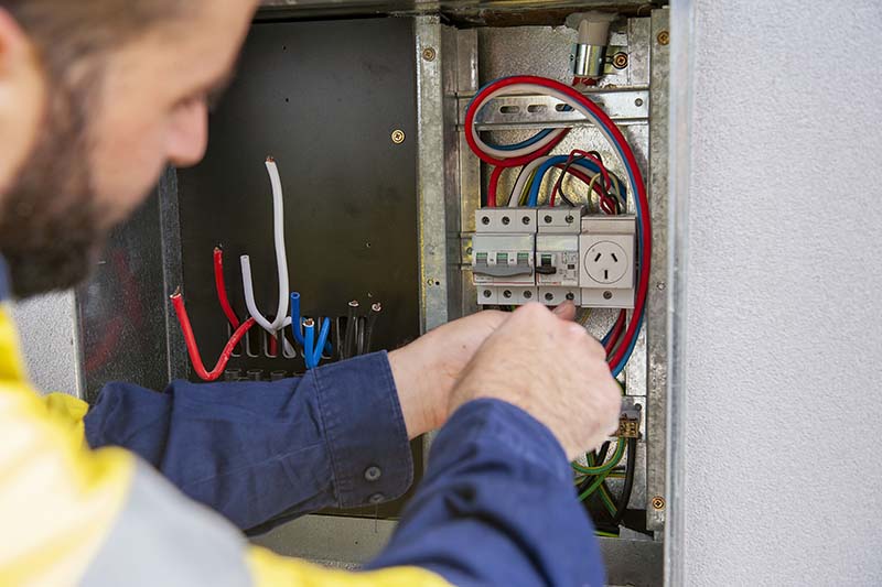 commercial electrician doing Switchboard Upgrades